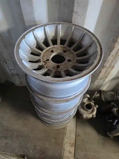 I'm selling a set of four used aluminum wheels, perfect for adding a classic look to your ride. Thes...