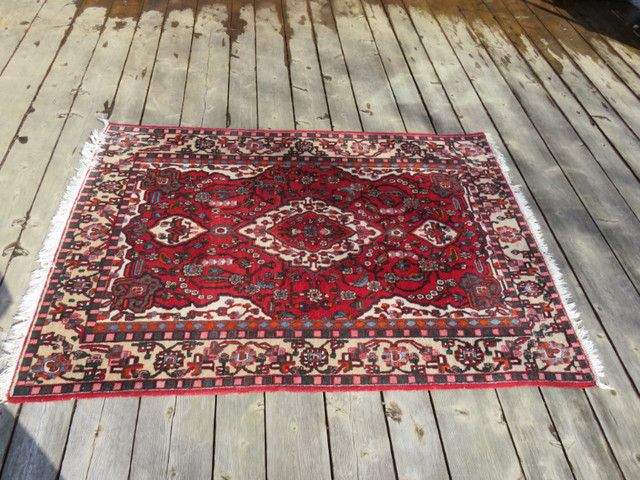 Vibrant Red patterned, fringed Rug in Rugs, Carpets & Runners in Oakville / Halton Region