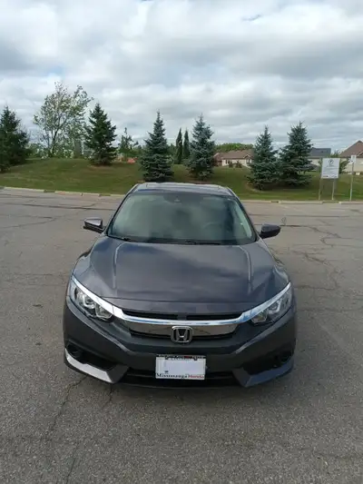 Overview Make: Honda Civic EX Year: 2017 Body type: Sedan Exterior colour: Grey Mileage: 60000 km Co...
