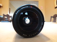 RMC Tokina 28-70mm Canon Film mount zoom lens.