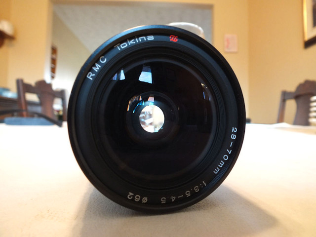 RMC Tokina 28-70mm Canon Film mount zoom lens. in Cameras & Camcorders in St. Catharines