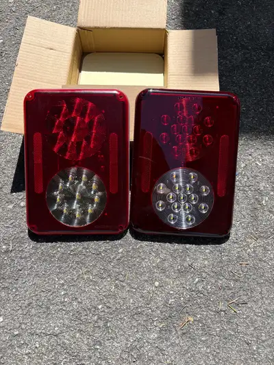 RV LED tail lights, one is new, the other one is slightly used.