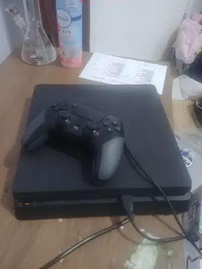 PlayStation 4 with wired controller with paddles, View more