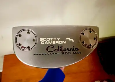 33” length. Mid size grip and 20 gram weights done at the Scotty Cameron Custom Shop. Putter is 8.5...
