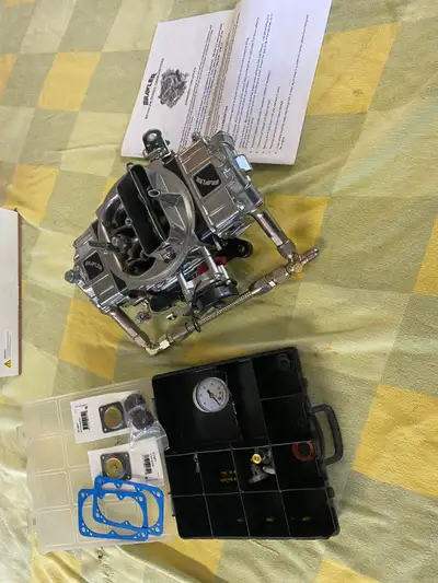 QUICK FUEL BRAWLER 750 CFM , MECH. SECONDARIES, ELEC. CHOKE, 4 CORNER IDLE, USED IT BRIEFLY LAST SUM...