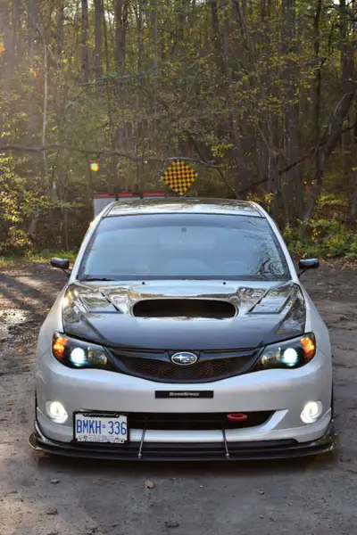 Looking for serious offers only. I am the second owner of this 2010 Pearl white WRX Sedan and have b...