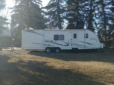 31 foot ultra lite trailer with 2 slides. Newly renovated interior with laminate flooring. It has a...
