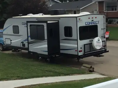 Purchased in 2020 but not delivered until 2021. Mint condition. Has dinette slide out which also mak...
