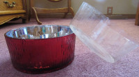 Red glass planter with plastic insert.