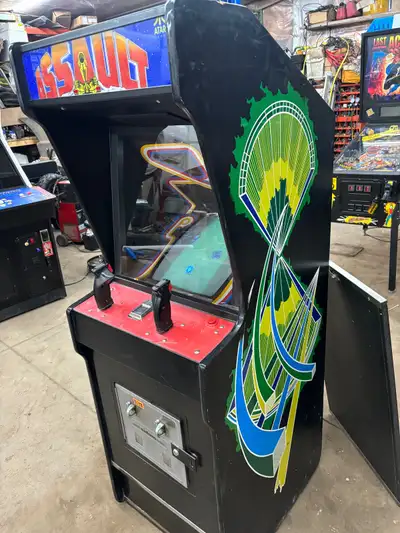 Title says it all. Working Atari assault arcade game. Game works as is, red is in and out, could use...