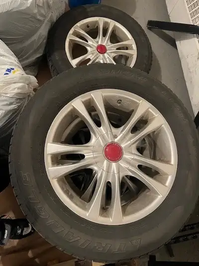 Winter Tires and Rims 225/55R17 Triangle Snow Lion Tires have very little use Comes with the rims Ri...