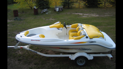 Rotax 2 stroke DI engine Jet drive runs great, comes with trailer, boat cover, spare tire, one small...