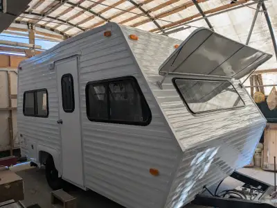 this travel trailer is fully restored and everything is brand new. appliances fridg, stove, tankless...