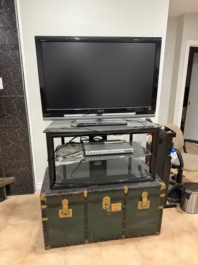 Sony TV, with a stand, View more