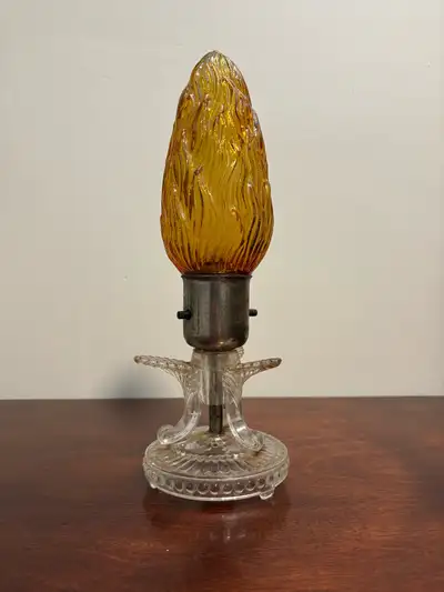 Amber glass flame lamp | pressed glass base, View more