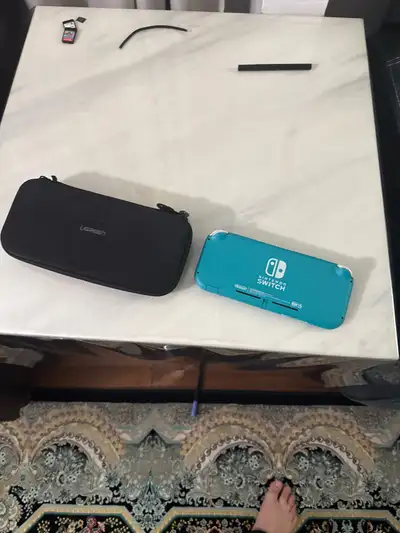 Nintendo switch with case, View more