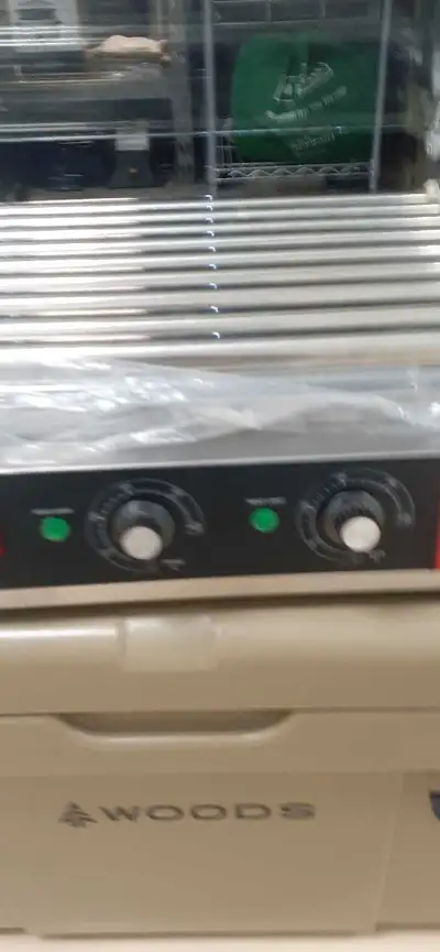 This commercial hot dog roller grill is in excellent, nearly new condition, featuring multiple stain...