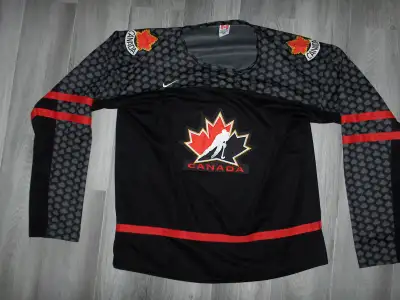 TEAM CANADA Size 54 IIHF CCM Jersey. As seen for $100. As new condition *except that the cuff on lef...
