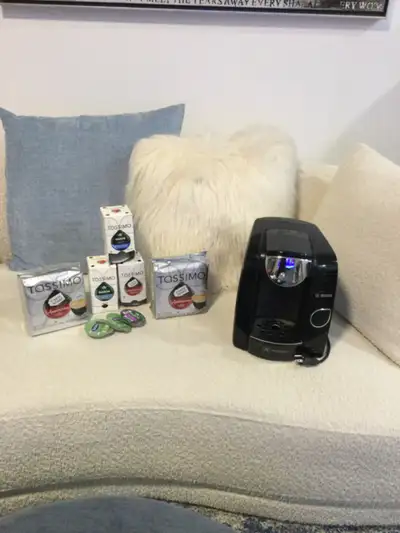 Tassimo coffee machine an pods, View more