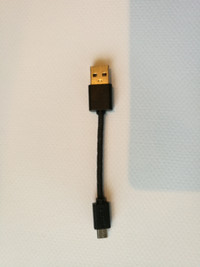 USB A male to micro B cable by Tzumi, 2 inches long. New