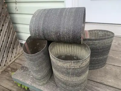 5 various - grade sand paper rolls Heavy to lighter weight grind