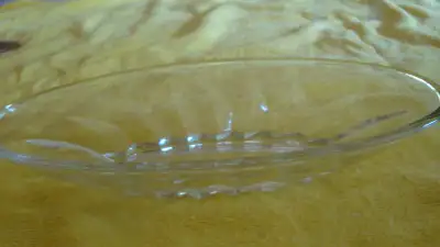 GLASS 10 INCH LONG BOAT SHAPED PICKLE DISH, View more