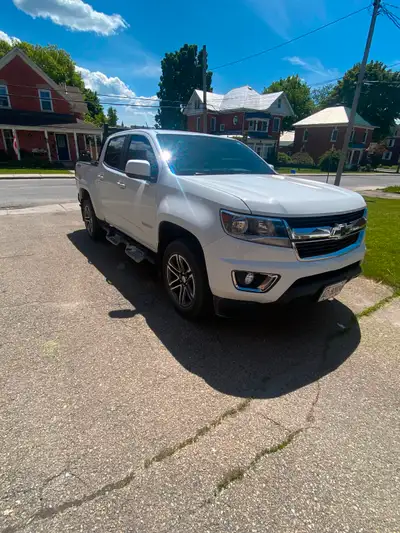 Colorado LT 4WD. Comes with tunnel cover, weathertech mats, winter tires on rims, all season on rims...