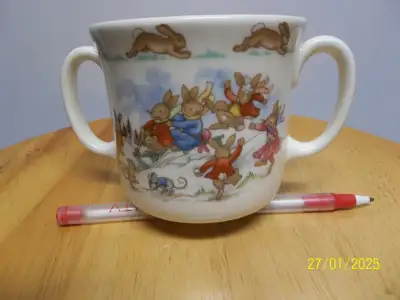 Commemorative twin handle cup by Royal Doulton of fine bone china. Commemorative of" To celebrate th...