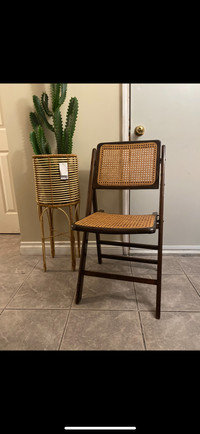 TWO WOODEN FOLDING RATTAN CHAIRS