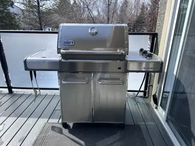 I'm selling a used stainless steel Webber BBQ with a convenient side burner, perfect for outdoor coo...