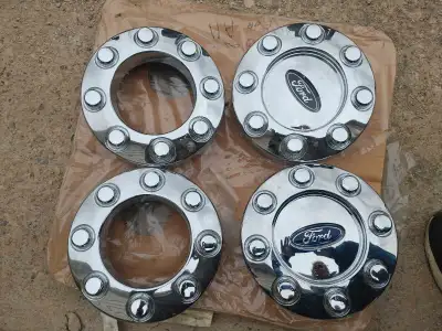 Set of 4 never used caps for a Ford F250 or F350. I think they are for a 2010 or so. Will fit severa...
