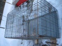 One Large 26.5"x 30"x 42.5" wire dog crate with reinforced gates