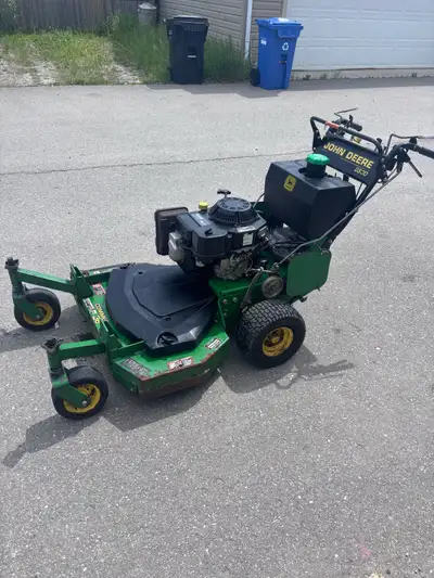 Commercial grade self-propelled and self turning walk behind lawnmower. Controls like a skidsteer, m...