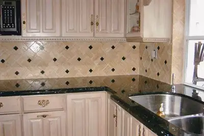 Transform your kitchen and bathroom with professional tile renovation services, featuring expert cra...