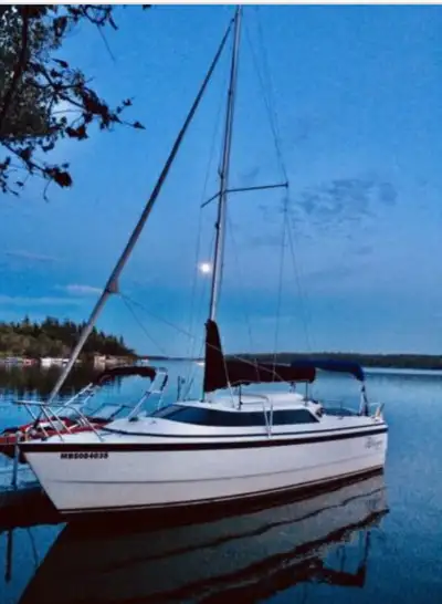26ft MacGregor X 1997 sailboat. -50 HP Honda four stroke outboard motor -1997 Trailer with new tires...
