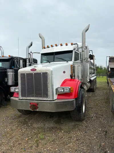 2005 Peterbilt 378 tri-drive dump truck 491,725 Kms 7559Hrs Caterpillar C15 15.2L diesel Eaton 18 sp...