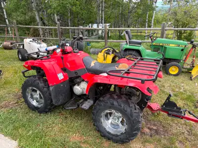 Engine runs great gears need slight adjustment, looks beet up but great plow or farm quad