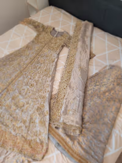 3-piece bridal dress from Karachi, Pakistan Includes wedding gown with train, ghagara skirt, and bri...