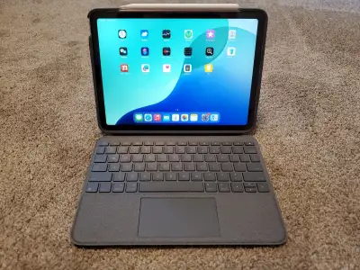 Available for immediate sale is the Apple iPad Air (4th generation). The iPad also includes: (1) cas...