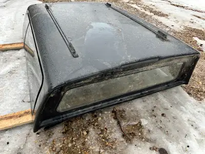 Black Leer Truck cap, came off a 2004 Chevrolet 2500 with 6.5’ box. $1000.