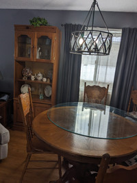 Dining room table, 24 in. leaf, 6 chairs and china cabinet.