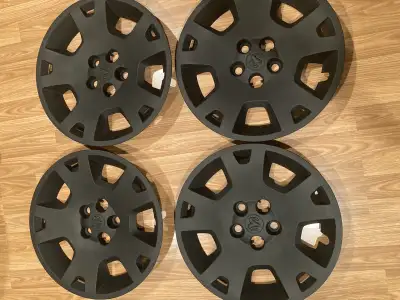 Flat black dodge charger hub caps. Good condition. One has a scuff on the edge (last picture). 5x114...