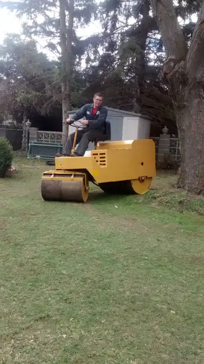 lawn rolling (2300 lb roller) aeration and dethatching service, View more
