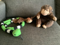 Toy snake, bat, and monkey hand puppet