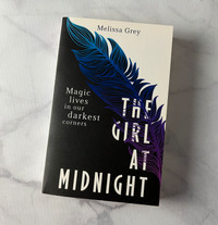 UK edition of THE GIRL AT MIDNIGHT by Melissa Grey
