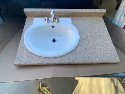 The vanity top has some scratches.