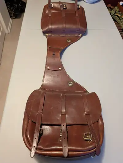leather saddlebags with canvas insert., View more