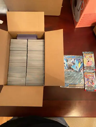 Over 1500 Pokemon cards, 2 Booster Packs & 1 Jumbo Card, View more