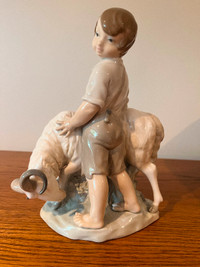 Lladro by Nao. Boy with Goat