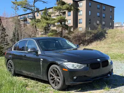 2014 BMW 3 Series Clean looking sedan with sporty handling and luxury comfort. Drives smooth, great...